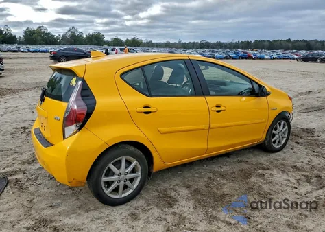 2015 Toyota Prius C from USA, damaged, VIN JTDKDTB3XF1097779